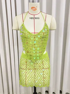 Detailed front view of a handmade lime green crochet beach cover-up with sequins