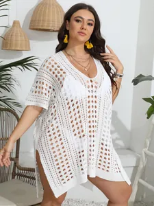 Vestido de playa blanco talla grande de ganchillo con diseño calado y escote en V profundo