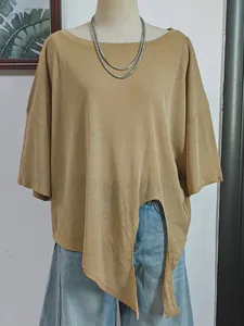 Close-up of khaki loose-fit boat neck top featuring an asymmetric split hem detail