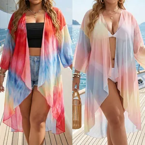 Macro view of flowing mesh fabric with vibrant tie-dye pattern on irregular beach cover-up