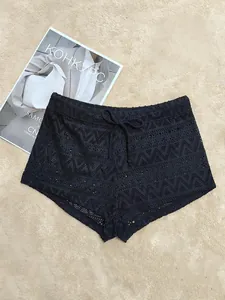 Women's black lace crochet mini shorts with functional drawstring for summer beach wear