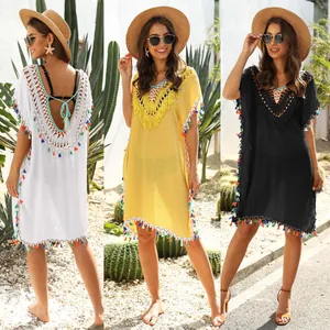 Three variants of crochet v-neck beach cover-ups with colorful tassels and open back detail