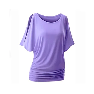 Purple batwing sleeve top featuring cold shoulder cutouts and a ruched bottom hem