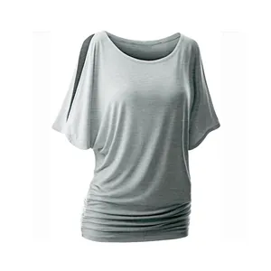 Close-up of a grey cold-shoulder batwing sleeve T-shirt with stylish ruched hem details.