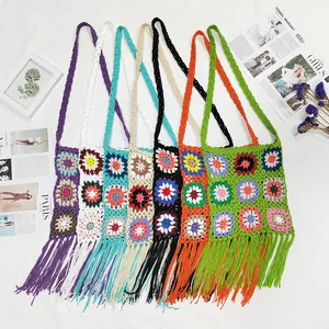 Variety of colorful retro granny square crochet shoulder bags with long fringe detail