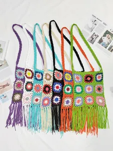 Handmade crochet granny square shoulder bags with colorful floral patterns and fringes