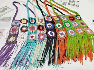 Colorful handmade crochet bags with granny square patterns and long tassels