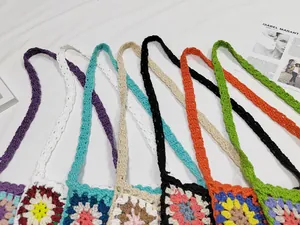 Variety of colorful handmade crochet granny square shoulder bags shown in a row