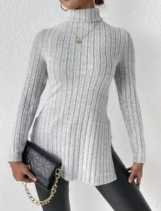 Close-up of grey high-neck ribbed knit sweater featuring side slits and slim fit design