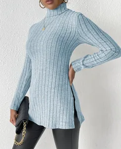 Detail view of light blue ribbed high-neck pullover with side slits for winter
