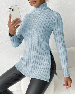 Detail shot of a women's light blue ribbed knit high neck sweater featuring a side slit