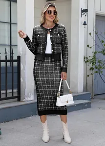 Detailed view of elegant women's black and white plaid cardigan and pencil skirt set