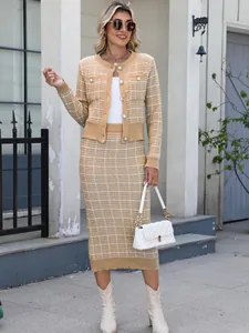 Elegant plaid knit two-piece set featuring a cardigan and a matching pencil skirt.