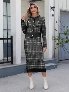 Elegant black and white plaid knit two-piece set featuring a cardigan and midi skirt