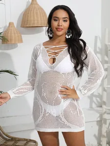 Plus size white crochet mesh beach cover-up dress with deep V-neck lace-up detail