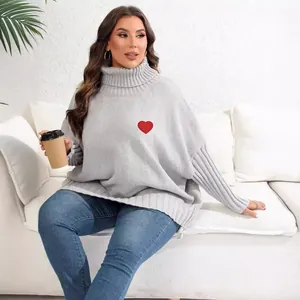 Loose fit plus size grey turtleneck sweater featuring a vibrant red heart embroidery patch