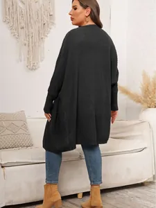 Stylish women's plus size black knitted cardigan featuring batwing sleeves and large pockets