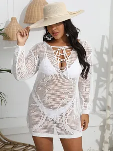 Elegant white crochet plus size beach cover-up with a deep V lace-up neckline detail