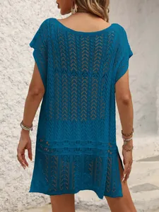 Elegant back view of blue crochet beach cover-up with hollow-out knit pattern for summer