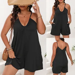 Detailed view of women's plus size black deep V-neck sleeveless romper with pockets