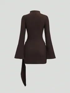 Detailed back view of a dark brown textured knit mini dress with elegant flared sleeves