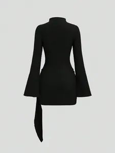 Detailed back view of a black textured knit mini dress with elegant long flare sleeves.