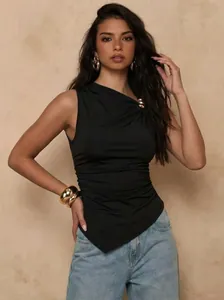 Chic black sleeveless top featuring a gold metal buckle and asymmetrical pleated hem