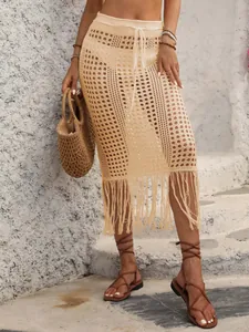 Boho-Strandrock in Creme gehäkelt mit Kordelzug und Fransen für Damen im Sommerurlaub