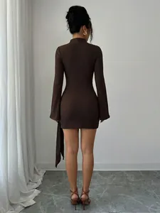 Elegant brown long-sleeve knitted mini dress with textured fabric and slim-fit design
