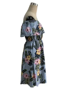 Side view of elegant off-the-shoulder floral print ruffle dress shown on mannequin