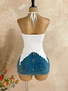 Detailed back view of a white mesh halter neck top featuring an irregular swallowtail hem