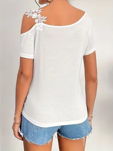 Back view of a white women's T-shirt featuring delicate lace applique on one shoulder