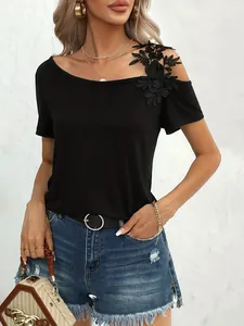 Elegant black off-the-shoulder T-shirt featuring intricate lace floral embroidery details