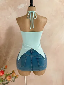 Back view of a light blue halter neck mesh top featuring a unique irregular swallowtail hem