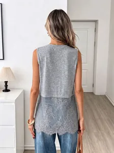 Back view of women's gray sleeveless tank top with floral lace patchwork hem detailing