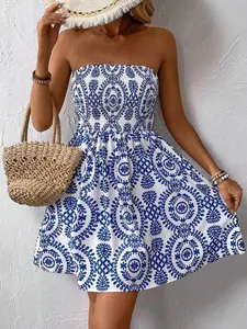 Elegant women's blue and white geometric print strapless mini dress for summer fashion