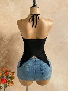 Back view of a black mesh halter top featuring an asymmetrical swallowtail hem design.