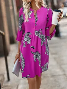 Elegant fuchsia leopard print dress with flare sleeves and button detailing for summer
