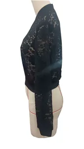 Side view detail of elegant black sheer floral lace jacket for women with ribbed cuffs
