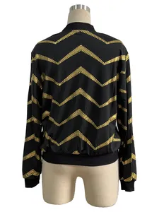 Detailed back view of a black women's bomber jacket with elegant gold zigzag pattern