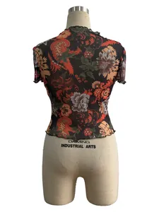 Back detail of a floral print mesh T-shirt featuring elegant lettuce edge trim design