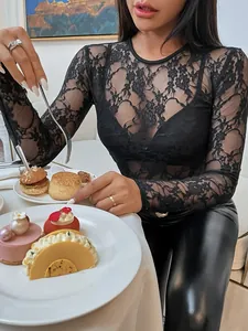 Elegant black lace slim-fit long sleeve top for women with round neck design