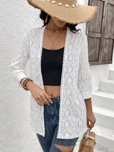 Elegante cárdigan de encaje blanco de ganchillo para mujer en vacaciones de verano
