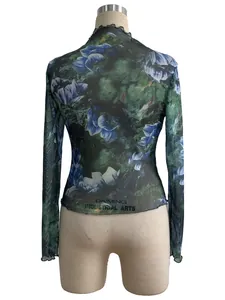 Detailed back view of elegant floral print mesh top with stand collar and lettuce trim
