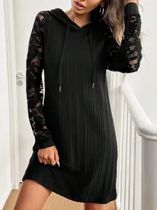 Elegant black women's mini dress with lace patchwork raglan sleeves and drawstring hood.