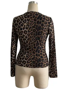 Back view of women's leopard print long-sleeve slim fit T-shirt on mannequin stand