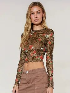 Close-up of leopard and rose print mesh long sleeve crop top with lettuce hem finish