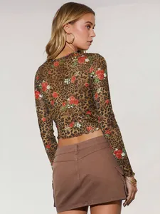 Detailed back view of a sheer leopard floral mesh long-sleeve crop top for women