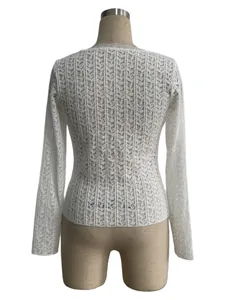 Detailed back view of women's white floral lace long-sleeve slim fit top shirt