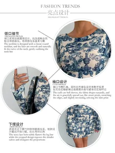 Detailed views of the round neckline, bell sleeves, and wavy lace hem on a printed mesh dress.